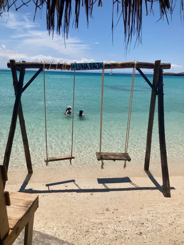 The waters are so calm that there are no waves.